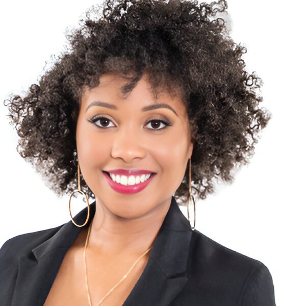 Woman in black blazer smiling