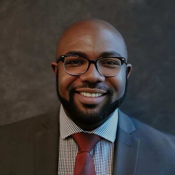 Businessman portrait with dark background