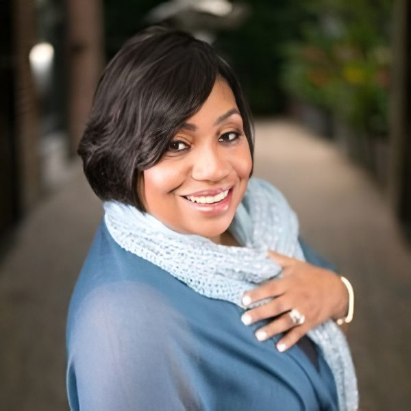 Happy woman posing outdoors