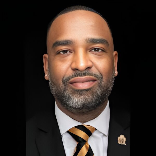 Confident man with beard and pin