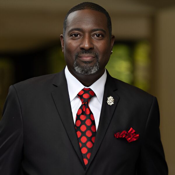 Man in suit with polka dot tie