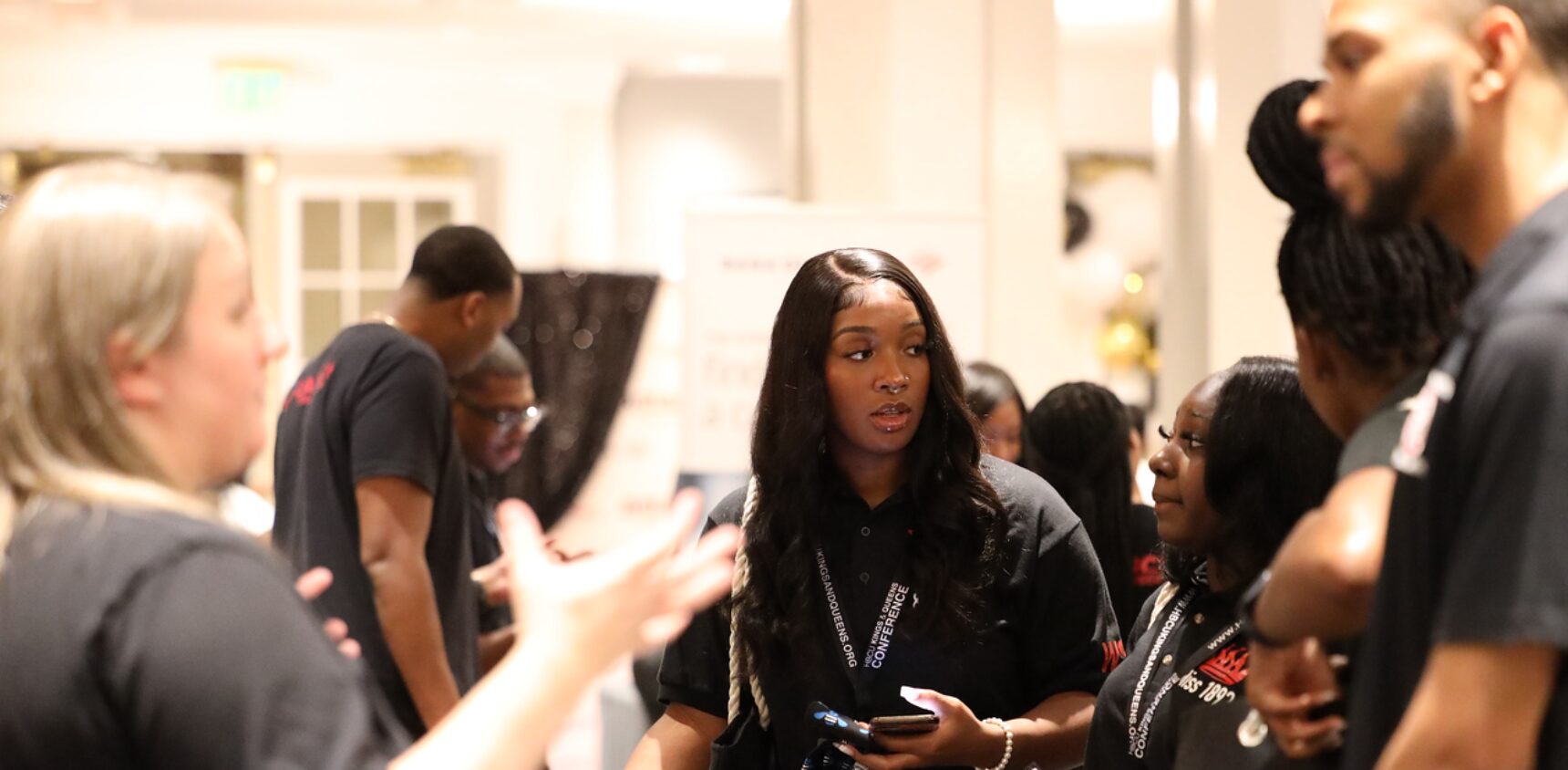 People networking in a conference setting