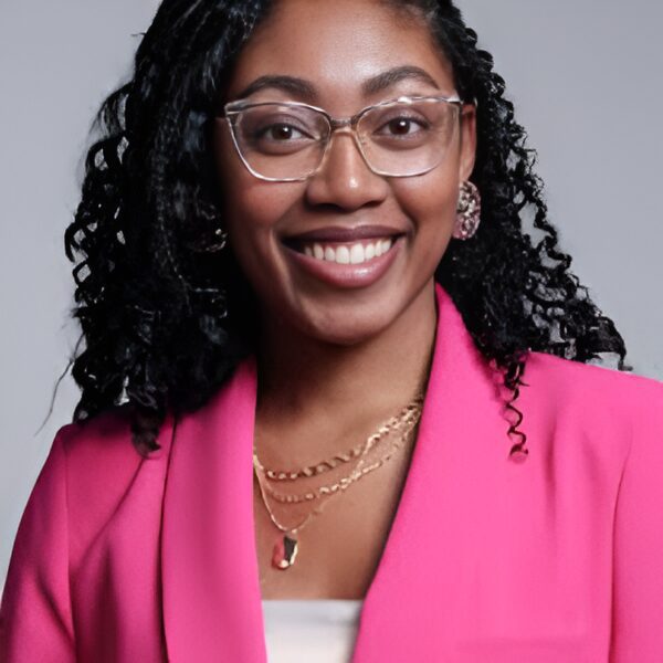 Confident woman wearing layered necklaces