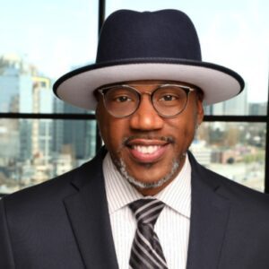 Smiling man with cityscape background