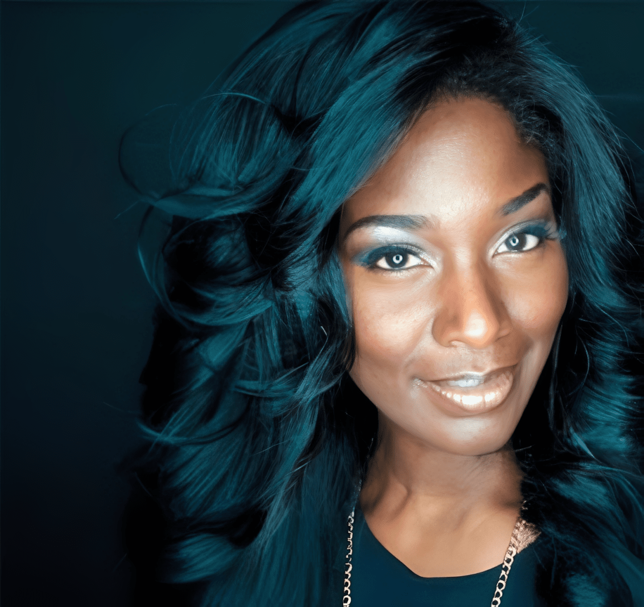 Smiling woman with long, flowing hair