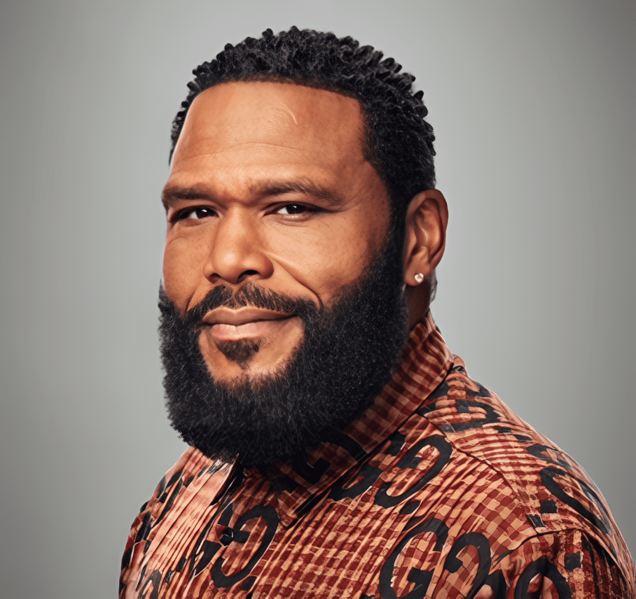 Man with short hair and earring