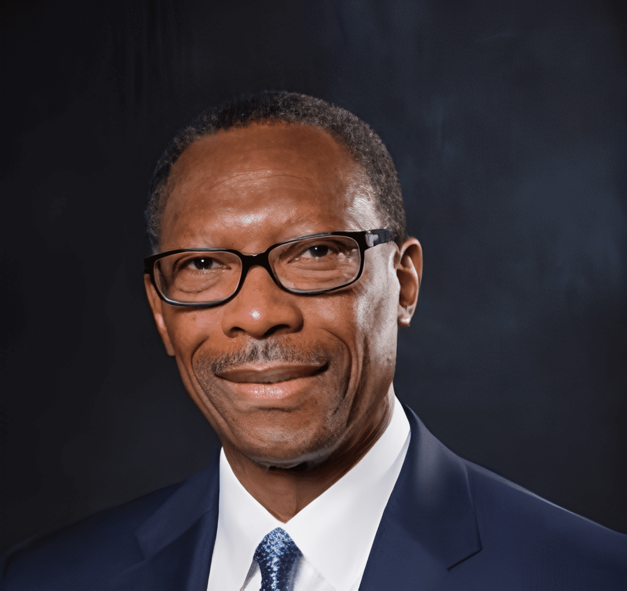 Smiling man in formal attire